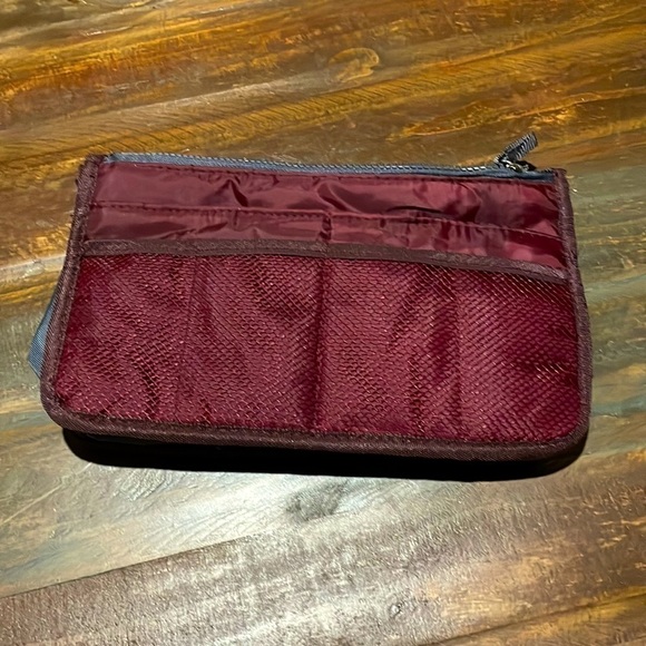 Travel maroon toiletry bag. 10” long by 6” tall. - Picture 2 of 9